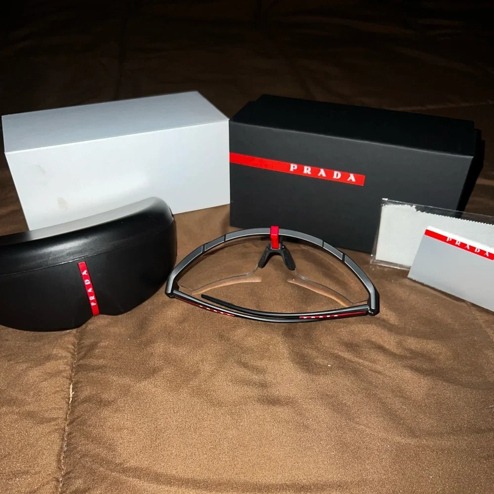 Prada Black Sunglasses with Red Accent Rimless Shield